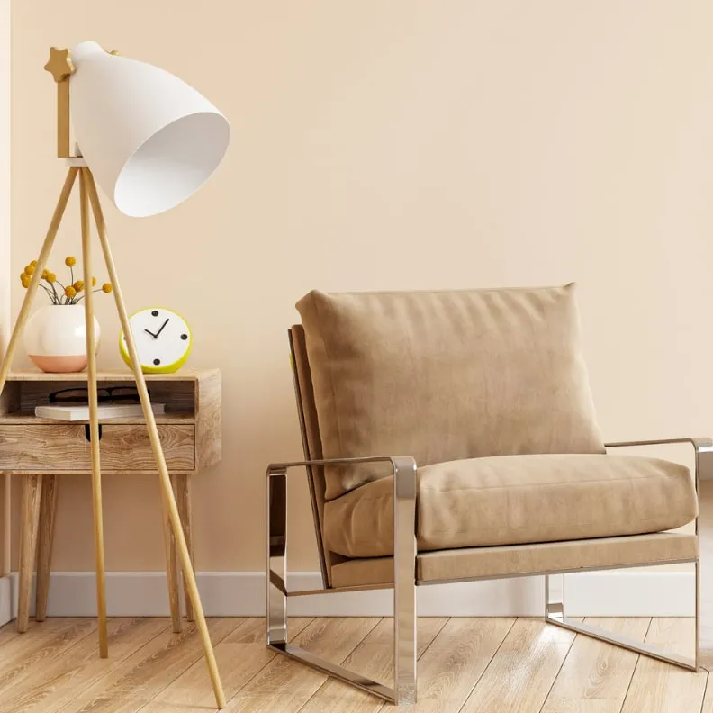 Cozy corner with an armchair and a floor lamp